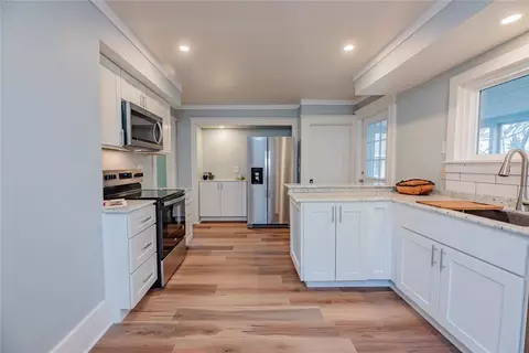 Kitchen - 104 E Main St, Waterloo, NY 13165 photo 2 of 3