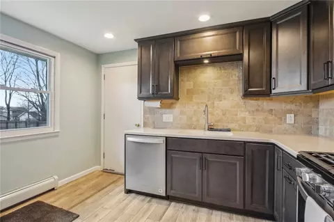 Kitchen - 113 E Buffalo St, Riga, NY 14428 photo 2 of 4