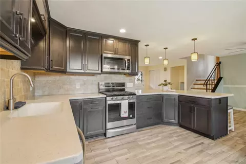 Kitchen - 113 E Buffalo St, Riga, NY 14428 photo 3 of 4