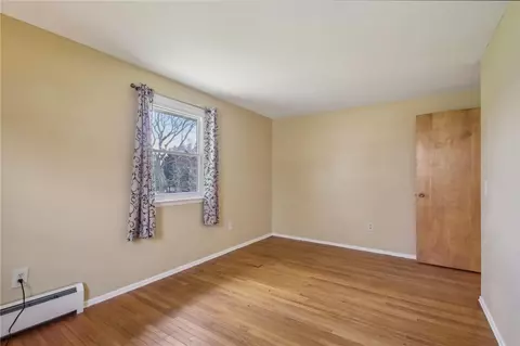 Bedroom - 113 E Buffalo St, Riga, NY 14428 photo 9 of 11