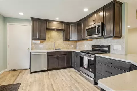 Kitchen - 113 E Buffalo St, Riga, NY 14428 photo 1 of 4