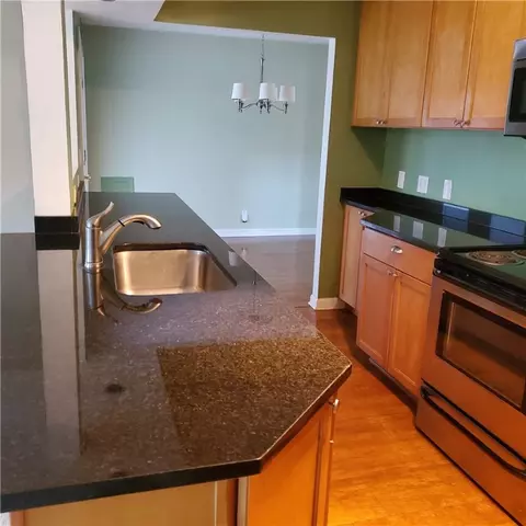 Kitchen - 75 Oakridge Dr, Irondequoit, NY 14617 photo 3 of 3