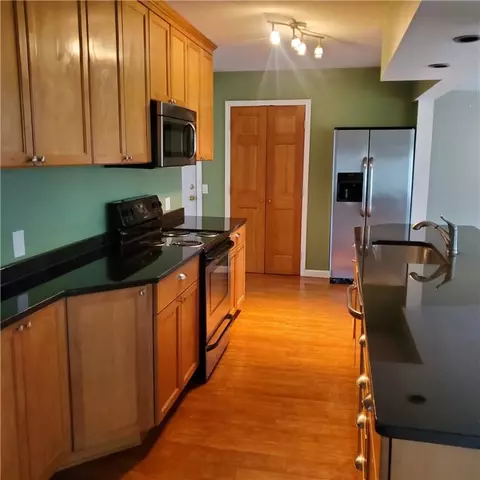 Kitchen - 75 Oakridge Dr, Irondequoit, NY 14617 photo 1 of 3