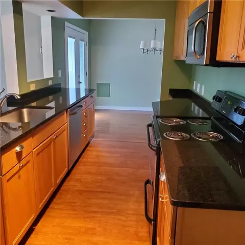 Kitchen - 75 Oakridge Dr, Irondequoit, NY 14617 photo 2 of 3