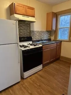 Kitchen - 76 Spencer Rd, Irondequoit, NY 14609 photo 2 of 2