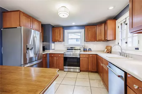 Kitchen - 380 Laurelton Rd, Irondequoit, NY 14609 photo 3 of 7