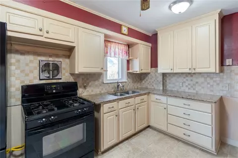 Kitchen - 50 Brett Rd, Irondequoit, NY 14609 photo 2 of 2