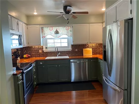 Kitchen - 439 Upper Valley Rd, Gates, NY 14624 photo 3 of 4