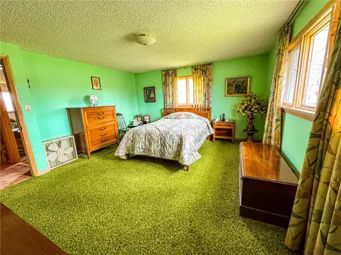 Bedroom - 8092 E Main Rd, Le Roy, NY 14482 photo 2 of 6