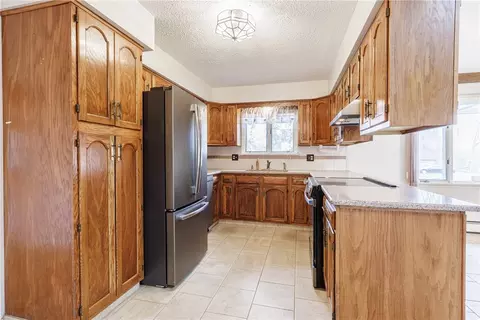Kitchen - 2 Simone Cir, Irondequoit, NY 14609 photo 3 of 4