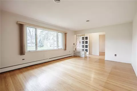 Living - 2 Simone Cir, Irondequoit, NY 14609 photo 1 of 7