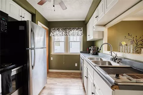 Kitchen - 64 Adrian Rd, Irondequoit, NY 14622 photo 2 of 4