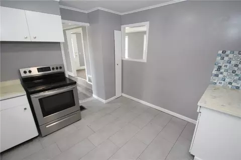 Kitchen - 569 Washington Ave, Irondequoit, NY 14617 photo 2 of 2