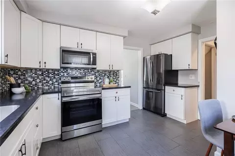 Kitchen - 262 Barry Rd, Irondequoit, NY 14617 photo 4 of 4