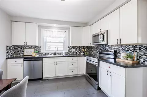 Kitchen - 262 Barry Rd, Irondequoit, NY 14617 photo 3 of 4