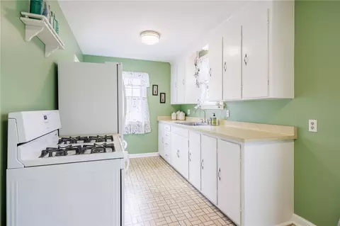 Kitchen - 309 Brandon Rd, Irondequoit, NY 14622 photo 3 of 5