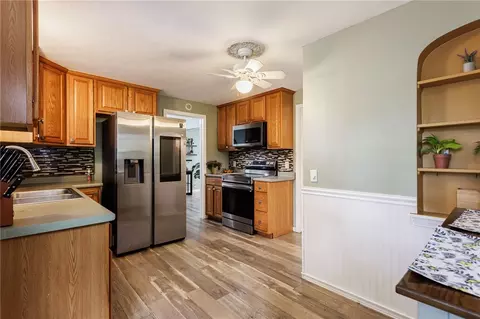 Kitchen - 387 Brandon Rd, Irondequoit, NY 14622 photo 2 of 3