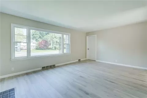 Living - 3245 Culver Rd, Irondequoit, NY 14622 photo 1 of 4