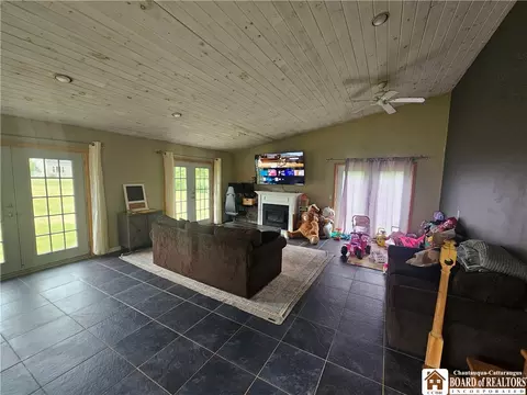 Living - 5705 County Road 38, Alma, NY 14708 photo 2 of 4