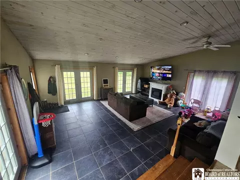 Living - 5705 County Road 38, Alma, NY 14708 photo 3 of 4