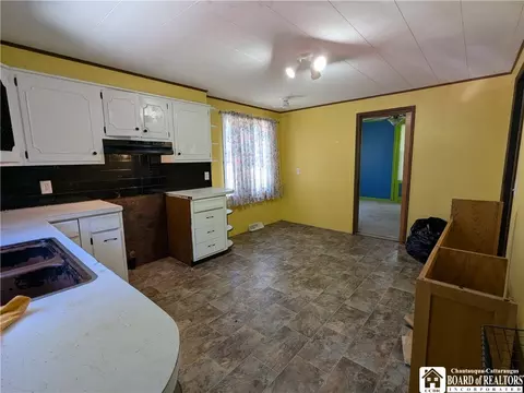 Kitchen - 164 E Main St, Springville, NY 14141 photo 2 of 2