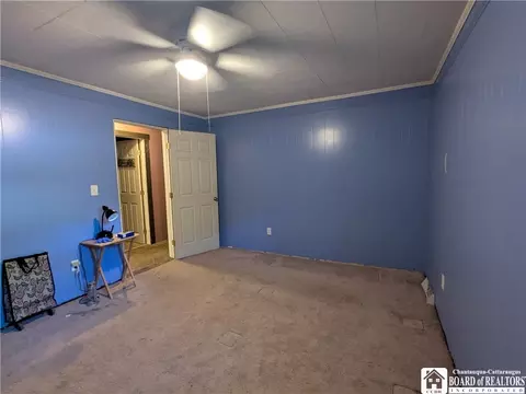 Bedroom - 164 E Main St, Springville, NY 14141 photo 2 of 5