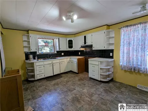 Kitchen - 164 E Main St, Springville, NY 14141 photo 1 of 2