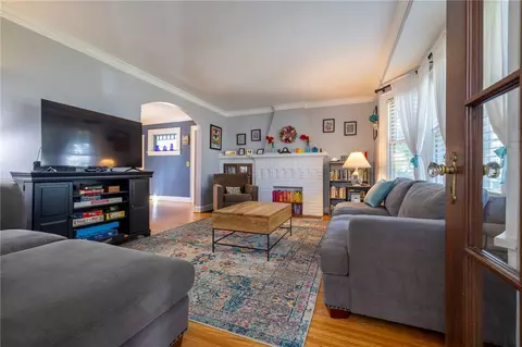 Living - 61 Wimbledon Rd, Irondequoit, NY 14617 photo 1 of 2