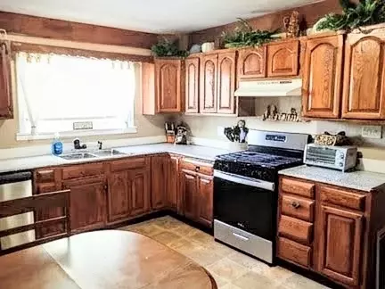Kitchen - 55 Eagle St, Mt Morris, NY 14512 photo 2 of 3