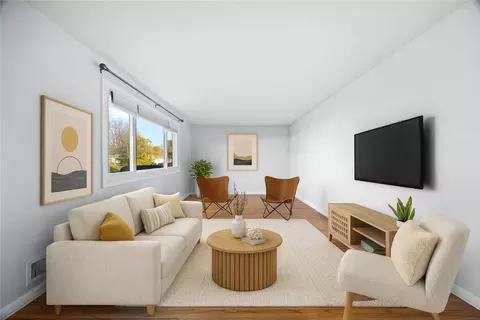 Living - 1145 Whitlock Rd, Irondequoit, NY 14609 photo 1 of 7