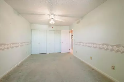 Bedroom - 55 Harbor Hill Dr, Irondequoit, NY 14617 photo 6 of 9