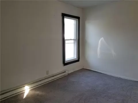 Bedroom - 52 Eagle St, Mount Morris, NY 14510 photo 2 of 5