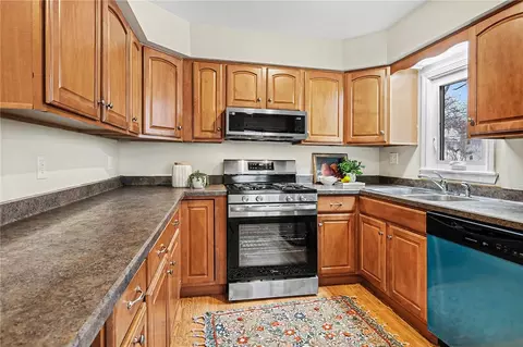 Kitchen - 383 Wimbledon Rd, Irondequoit, NY 14617 photo 2 of 2