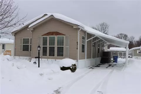 6316 Whispering Woods Dr, Williamson, NY 14589