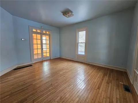 Living - 332 E 2nd St, Corning, NY 14830 photo 2 of 6