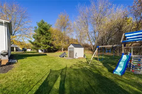 Exterior - 8495 Stringham Dr, Batavia, NY 14020 photo 7 of 9