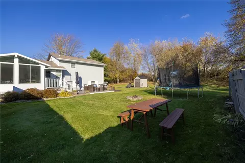 Exterior - 8495 Stringham Dr, Batavia, NY 14020 photo 5 of 9
