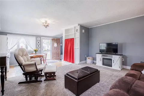 Living - 189 Cinnabar Rd, Irondequoit, NY 14617 photo 3 of 3