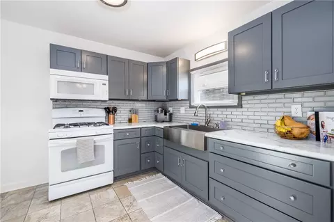 Kitchen - 119 Walzer Rd, Irondequoit, NY 14622 photo 2 of 3