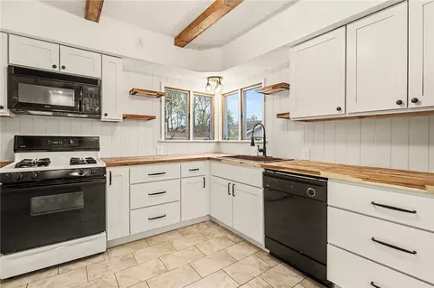 Kitchen - 85 Maplehurst Rd, Irondequoit, NY 14617 photo 2 of 2