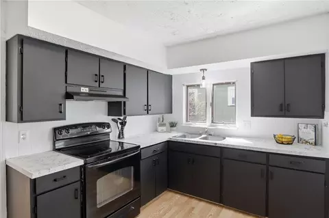 Kitchen - 141 Cooper Rd, Irondequoit, NY 14617 photo 2 of 4