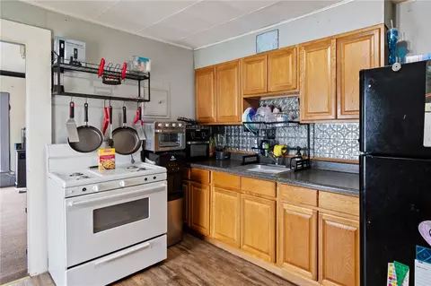 Kitchen - 37 Holley St, Lyons, NY 14489 photo 2 of 2