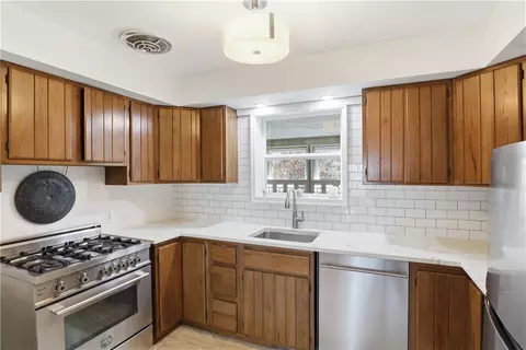 Kitchen - 4877 Culver Rd, Irondequoit, NY 14622 photo 1 of 2