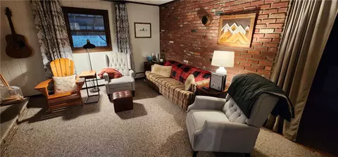 Living - 121 Okara Rd W, Webb, NY 13420 photo 1 of 2