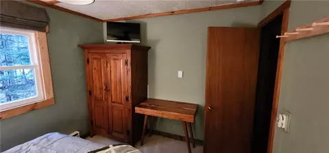 Bedroom - 121 Okara Rd W, Webb, NY 13420 photo 2 of 3