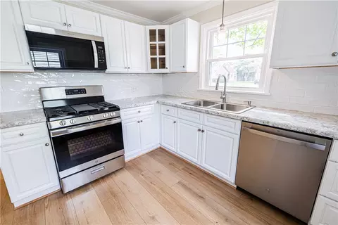 Kitchen - 100 Biltmore Dr, Irondequoit, NY 14617 photo 2 of 2