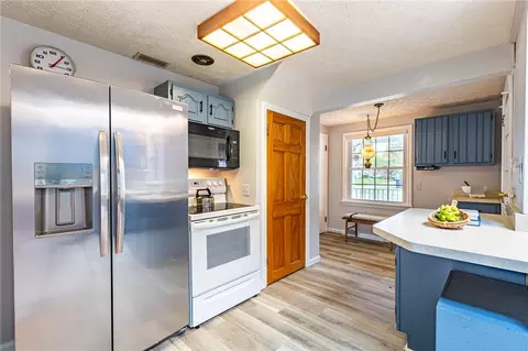 Kitchen - 353 Pinecrest Dr, Irondequoit, NY 14617 photo 4 of 4