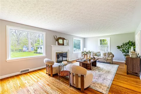 Living - 353 Pinecrest Dr, Irondequoit, NY 14617 photo 1 of 7