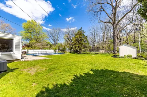 Exterior - 353 Pinecrest Dr, Irondequoit, NY 14617 photo 6 of 9