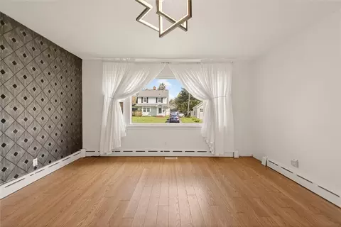 Living - 126 Wildmere Rd, Irondequoit, NY 14617 photo 6 of 8